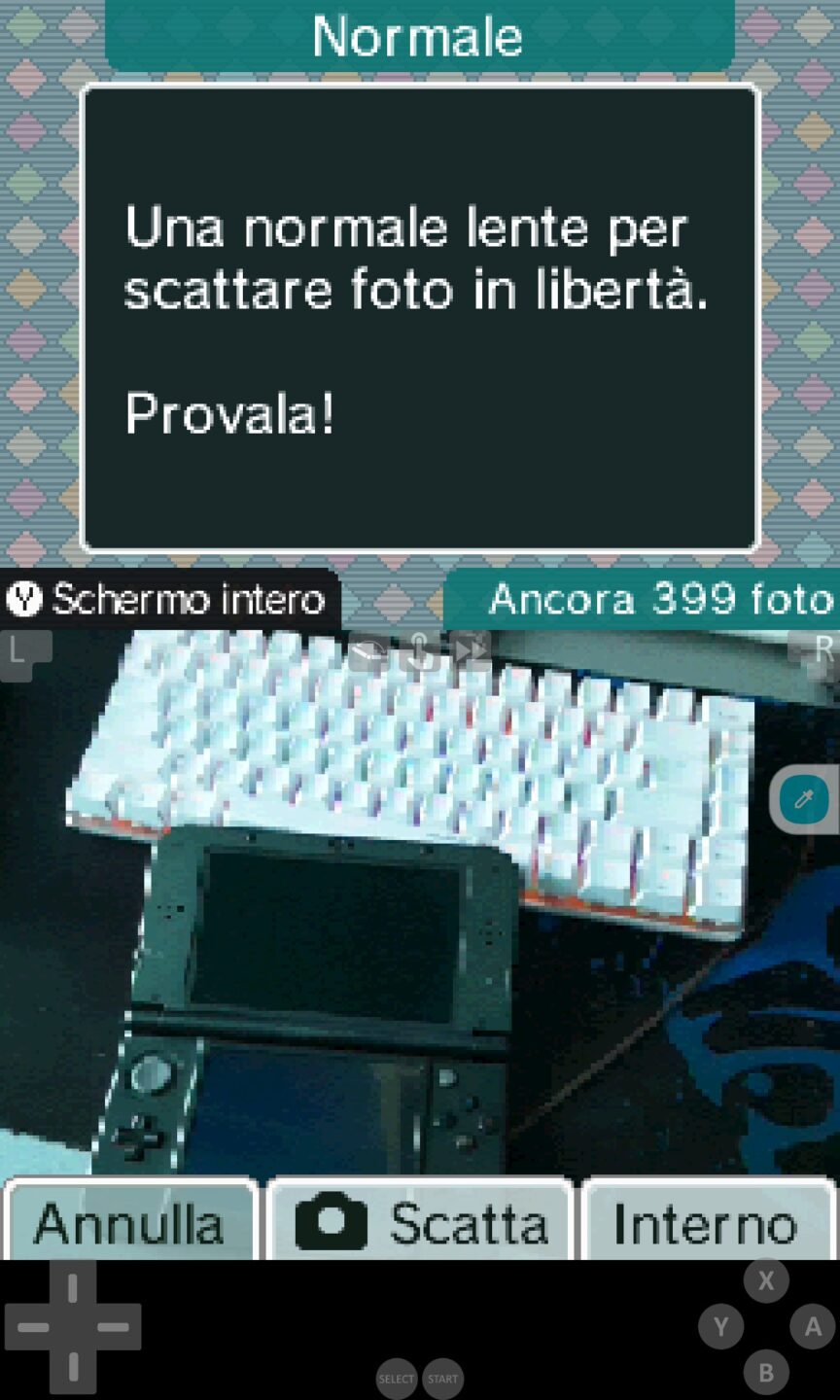 Screenshot di melonDS-android sul tablet che esegue la camera DSi, che punta alla mia scrivania con la tastiera e il n3DSXL.